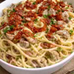 Creamy Bacon Carbonara with Chicken in a big white bowl