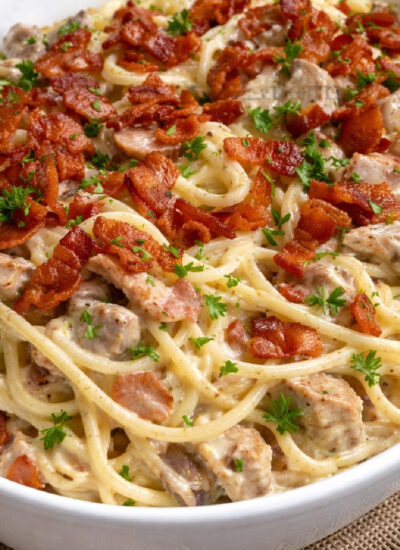 Creamy Bacon Carbonara with Chicken in a big white bowl