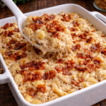chicken bacon ranch casserole in a white baking dish