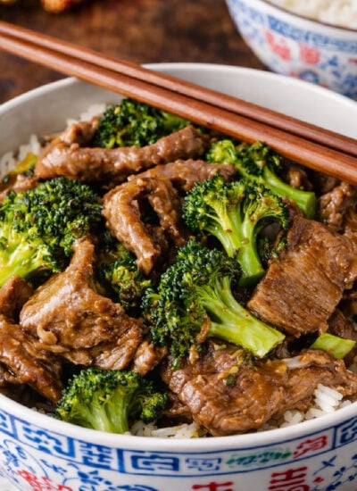 Slow Cooker Beef & Broccoli in a pretty chinese printed bowl