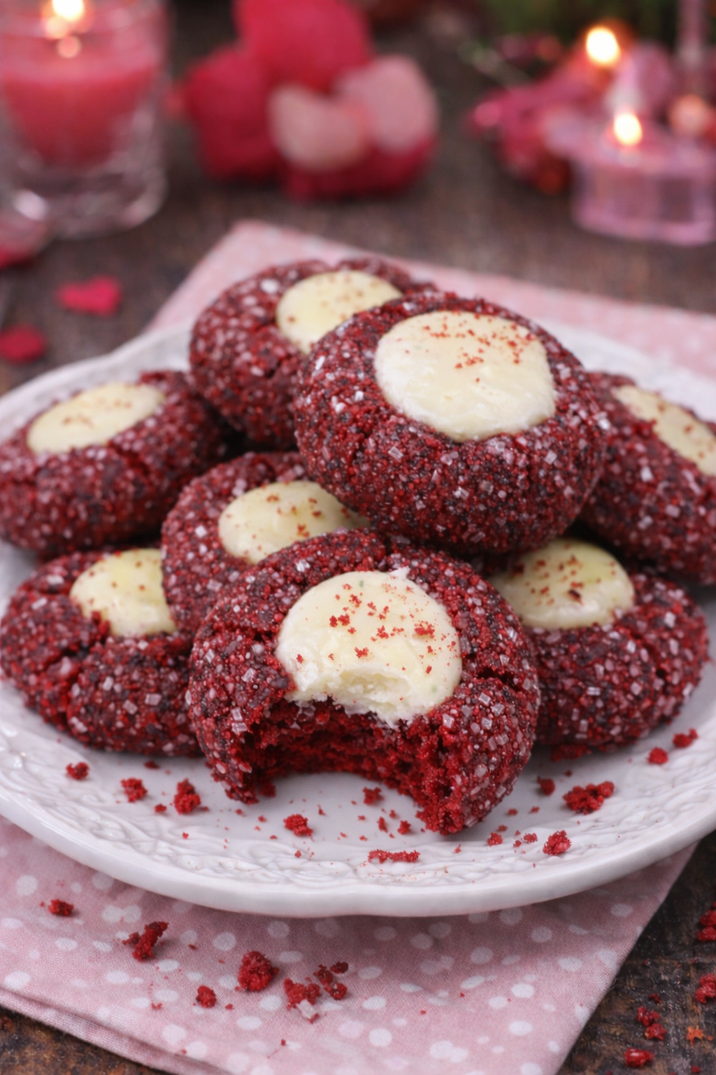 Red Velvet Cheesecake Thumbprint Cookies on a white plate 