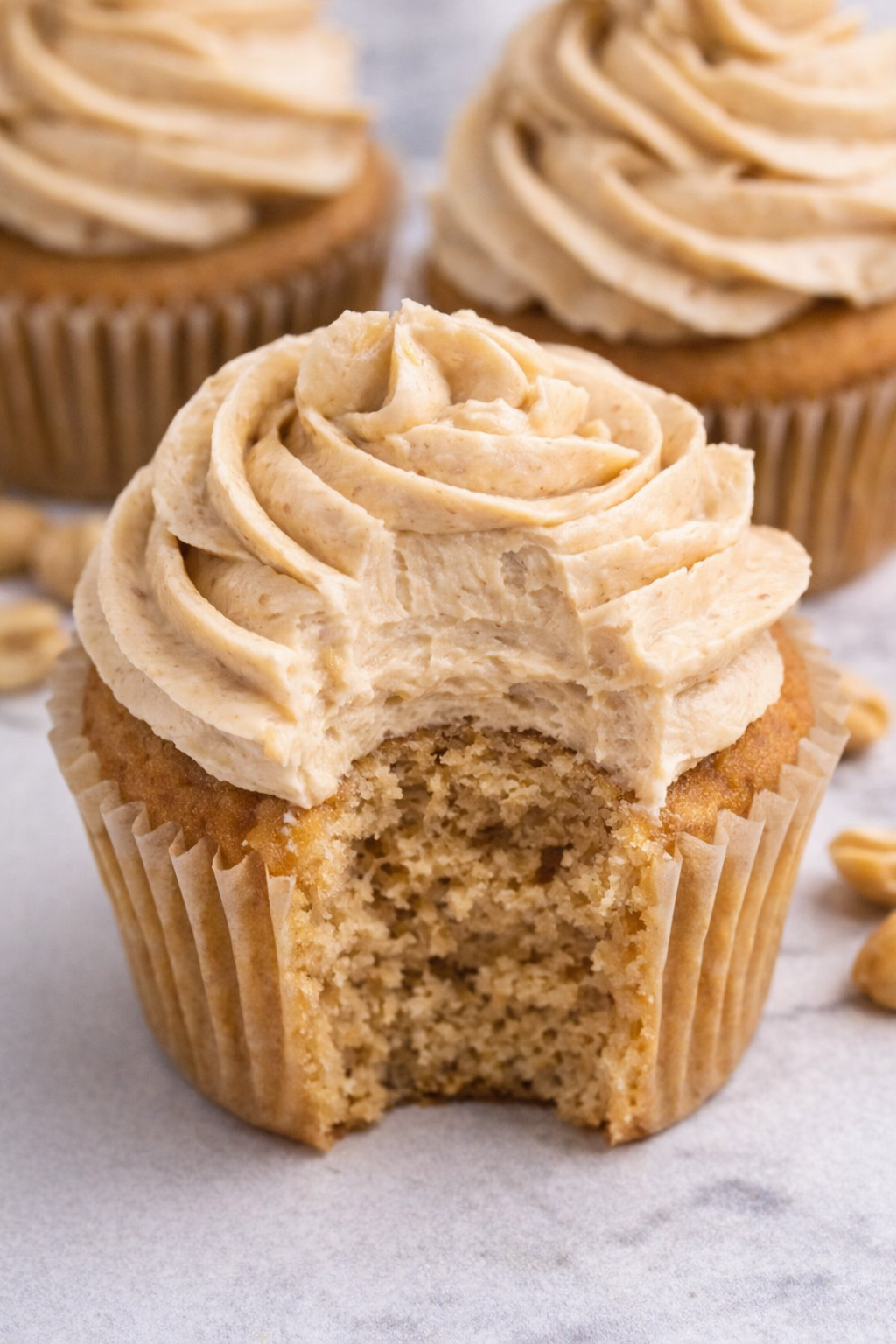 Peanut Butter Frosting on top of a peanut butter cupcake 