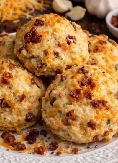 Cheesy Bacon Garlic Biscuits on a white pretty plate
