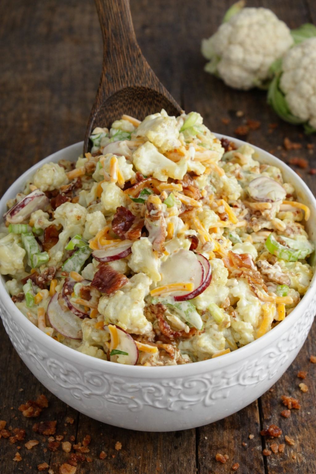 Loaded Cauliflower Salad in a pretty white bowl