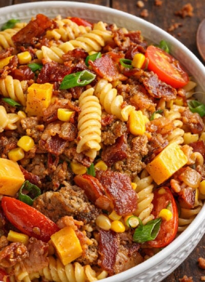 Loaded Cowboy Pasta Salad in a pretty white bowl