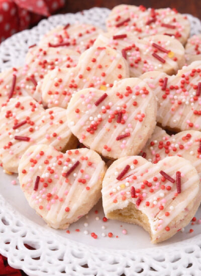 Valentines day shortbread cookie bites on a pretty white plate