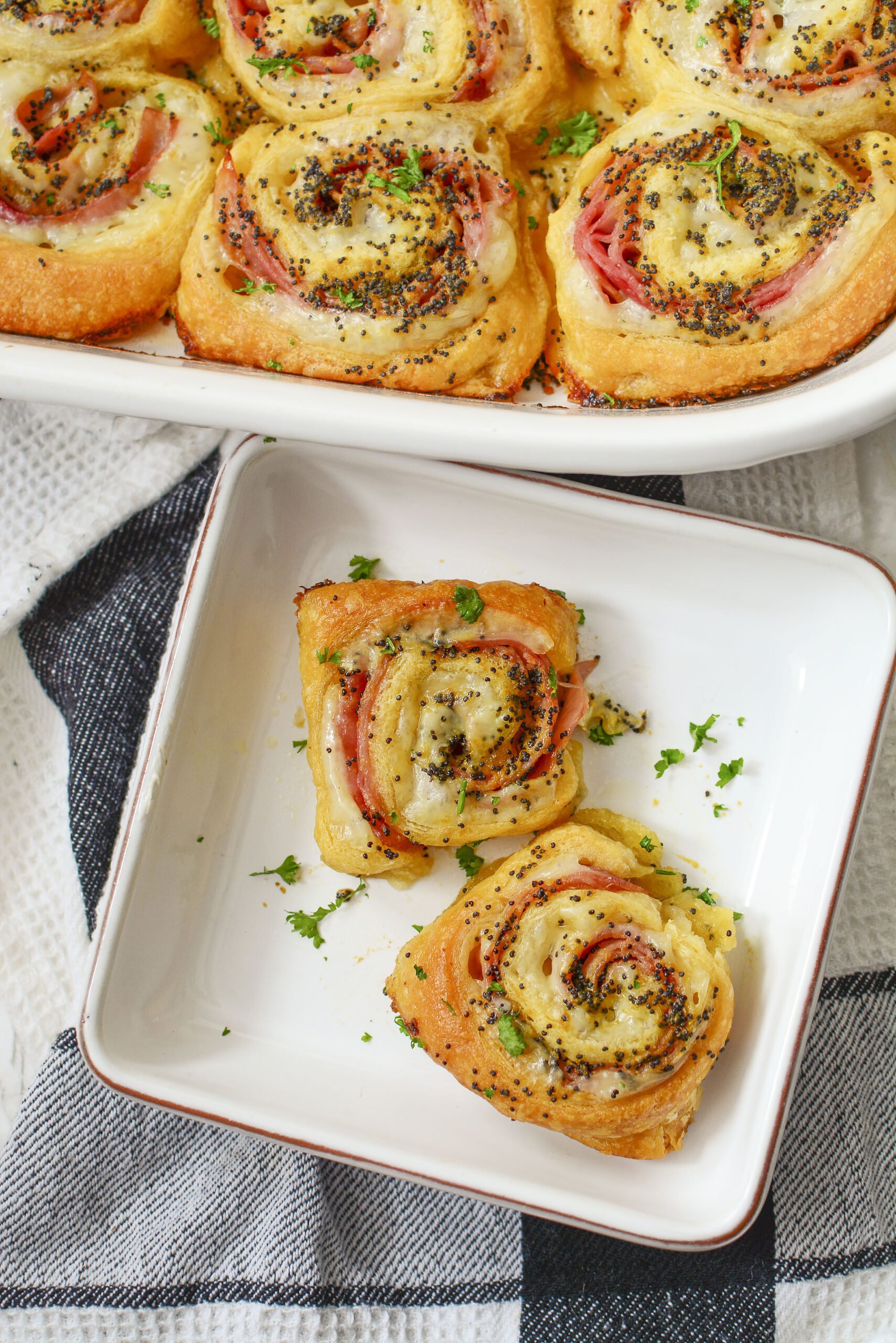 Ham and Cheese Pinwheels on a square white plate