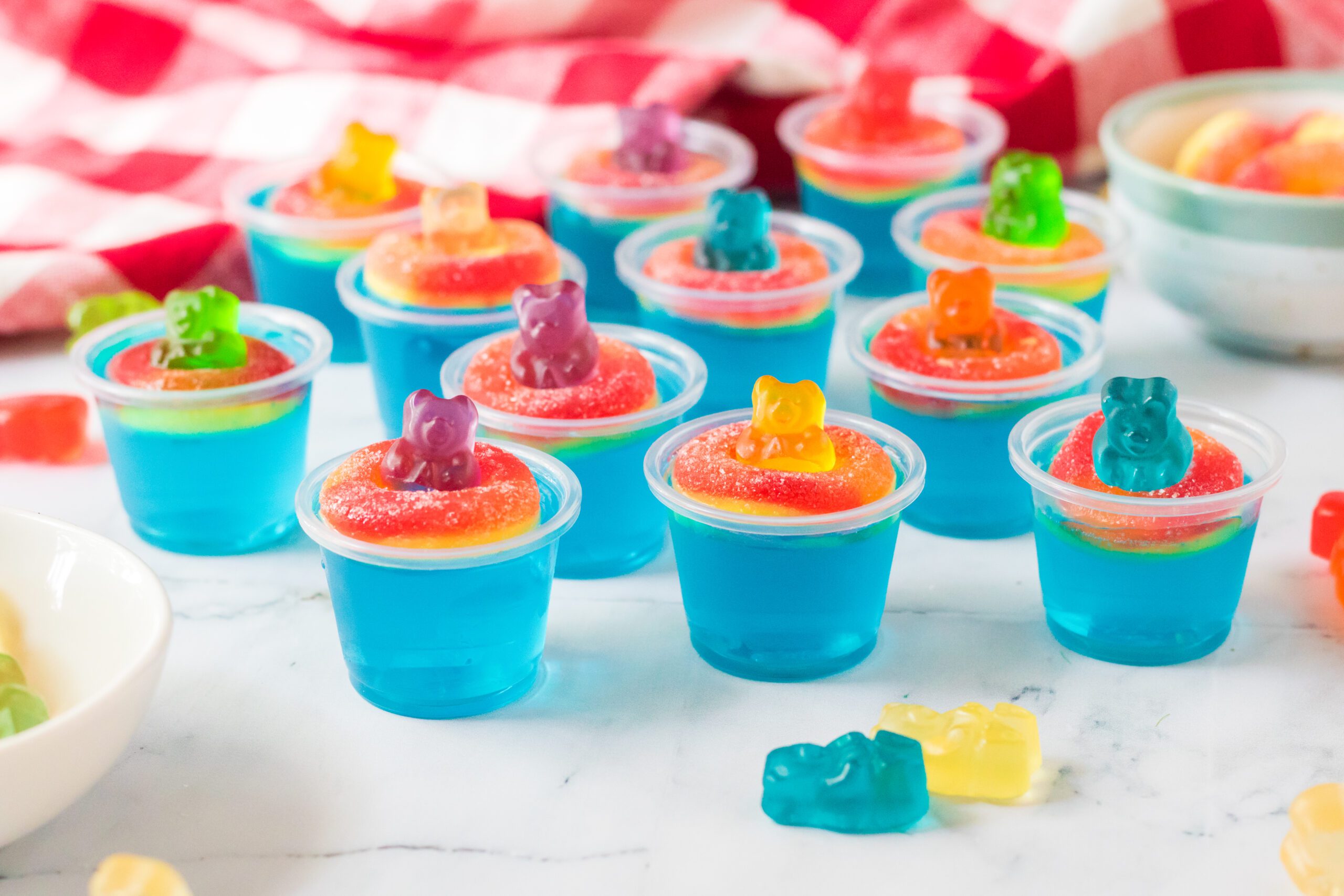 Pool Party Jello Shots on a white marble table