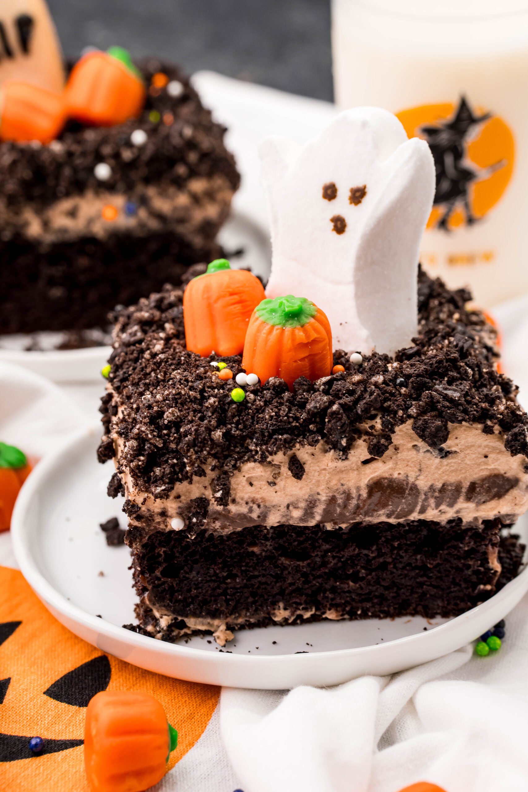 Halloween Dirt Cake slice on a white plate