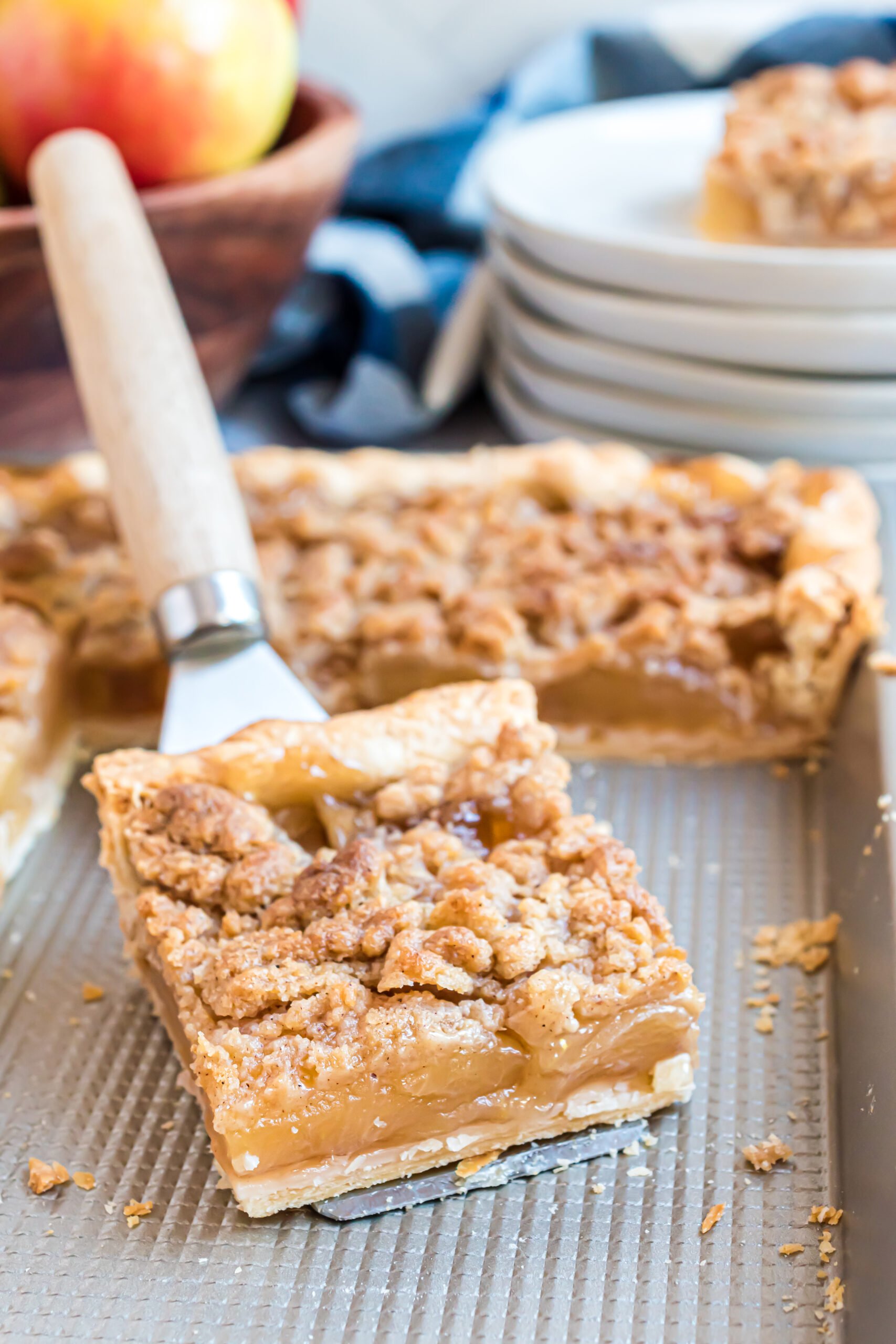 Apple slab pie on a silver baking sheet 