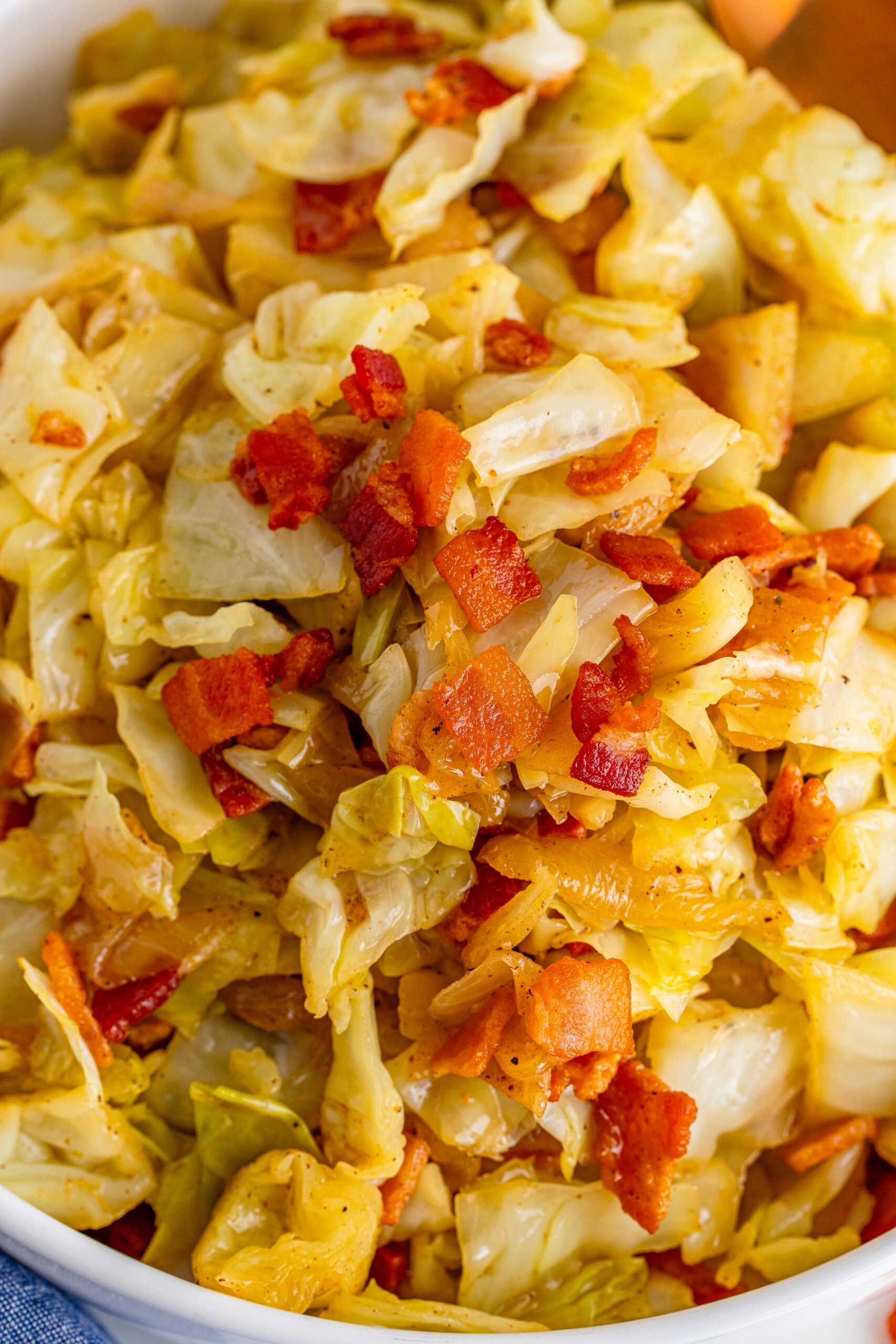 Close up shot of the bacon fried cabbage 