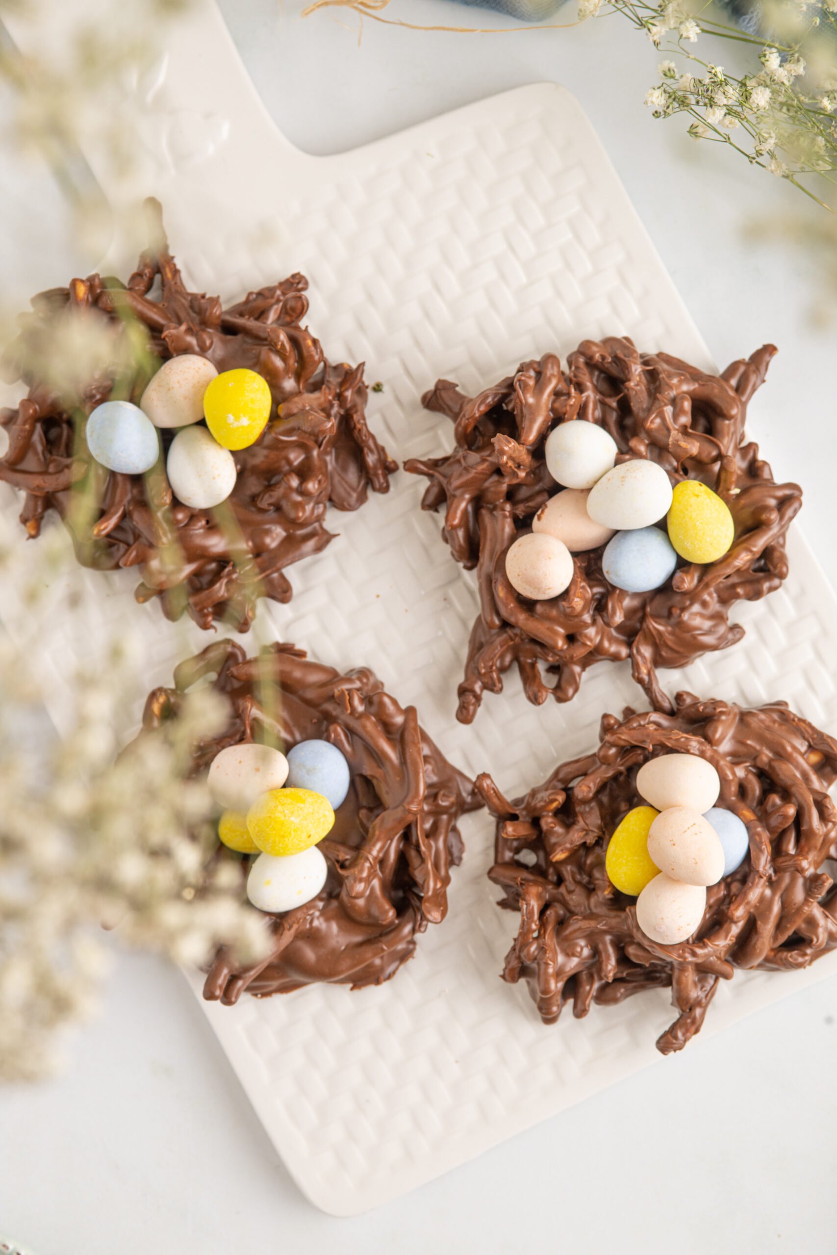 Overhead shot of Birds Nest Cookies on a white serving tray. 