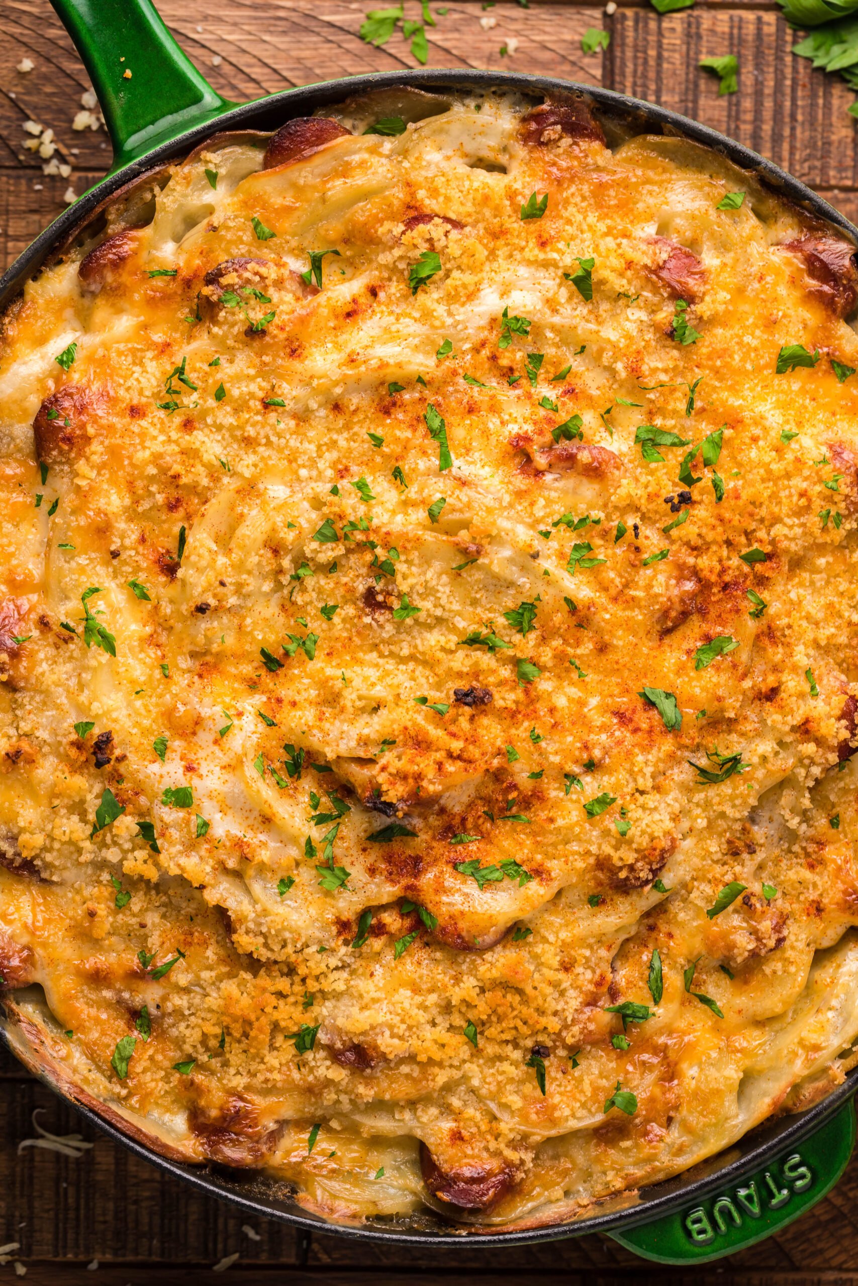 Overhead view of Au Gratin Potatoes & Ham in a cast iron skillet.
