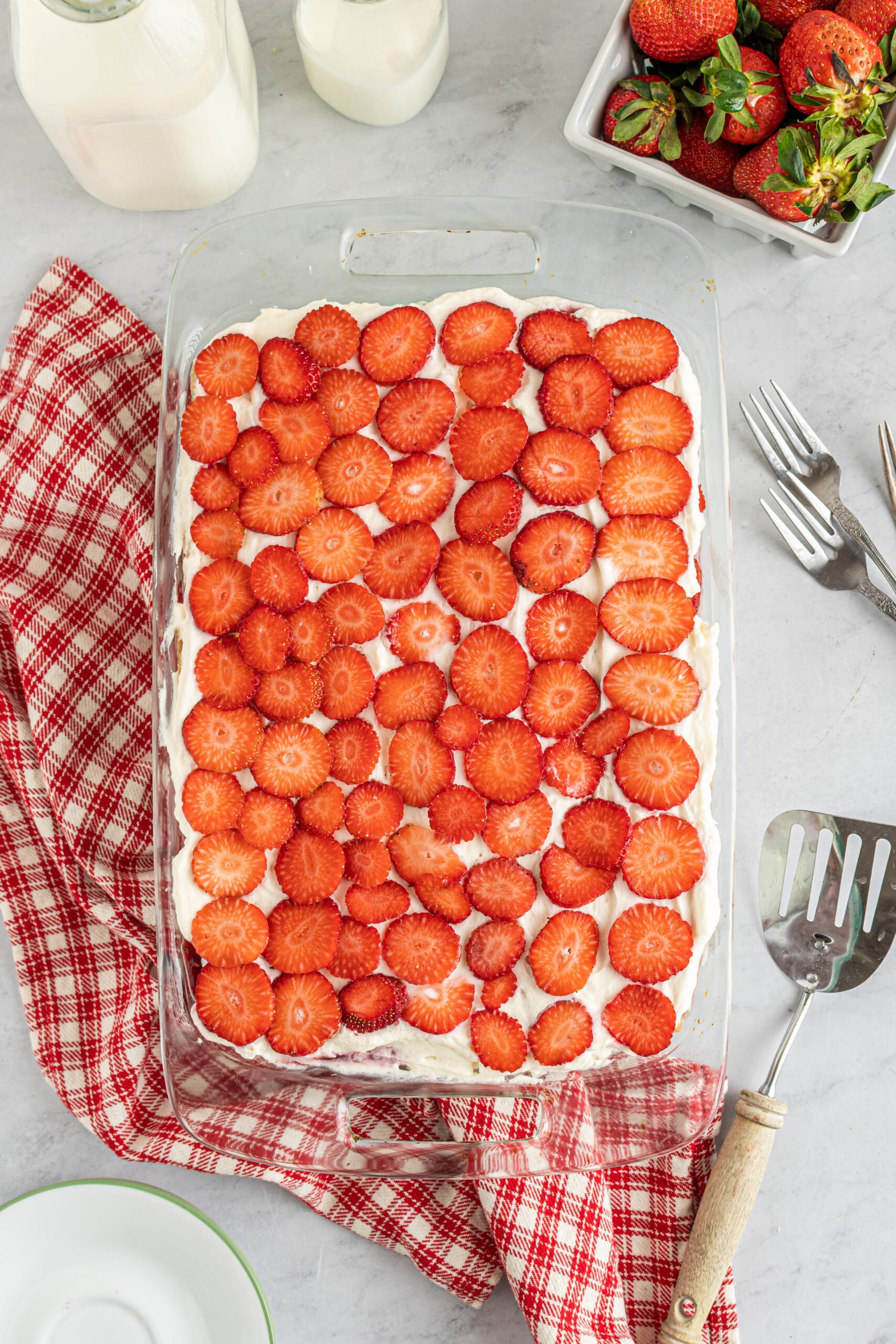 Overhead view of Strawberry Icebox Cake in a clear baking dish. 