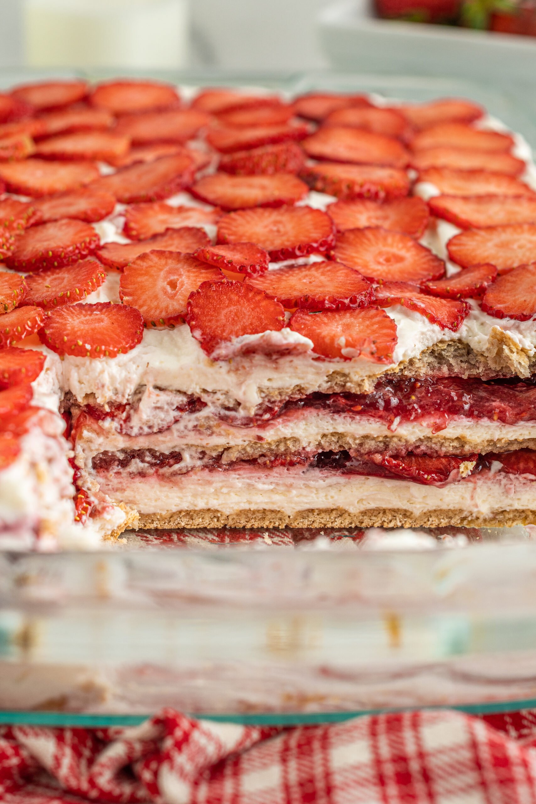 Close up of the layers of the Strawberry Icebox Cake showing the different layers. 