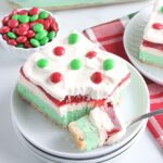 Christmas Lasagna sliced on plate with a bite full on fork