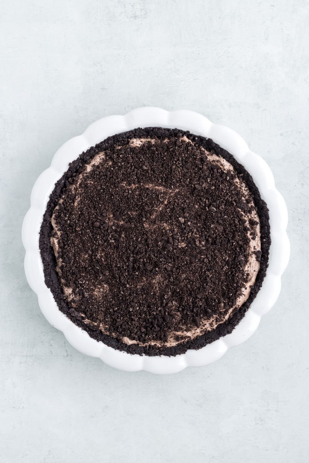 Oreo crumbles on top of the pie 