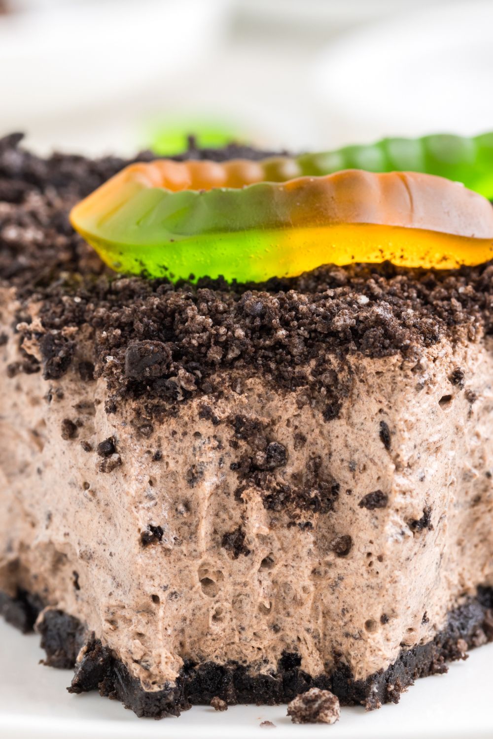 Dirt Pie with bite taken out of it on plate 