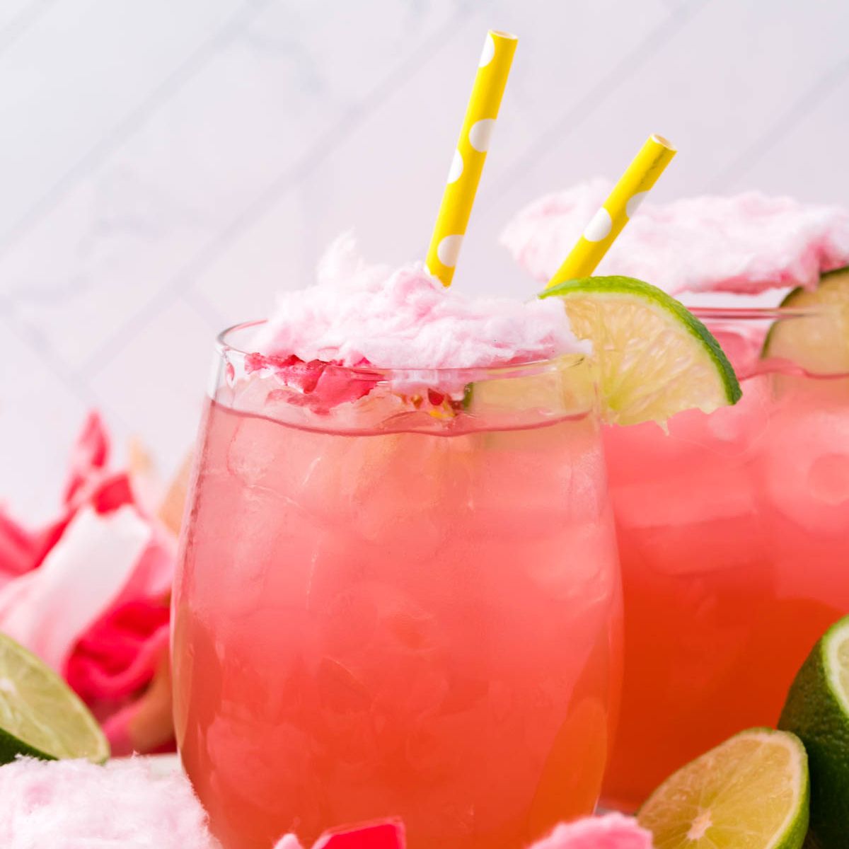 Cotton Candy Margaritas on table with straws in glasses