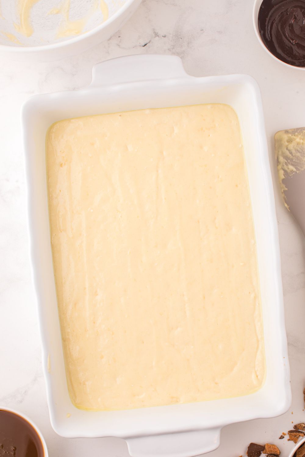 cake batter in a 9x13 pan 