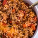 Stuffed Pepper Casserole in a bowl with fork on the side