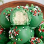 Lofthouse Christmas Truffles in a bowl with one has a bite taken out of it