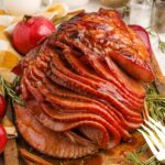 Dr. Pepper Ham on platter with forks beside tray