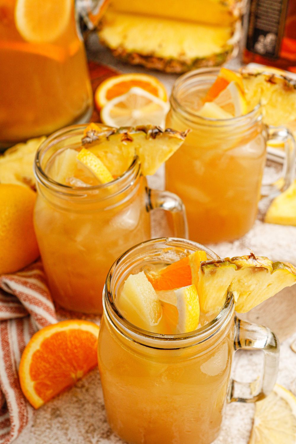 Touchdown Tea in glass on table with fruit sliced around each cup
