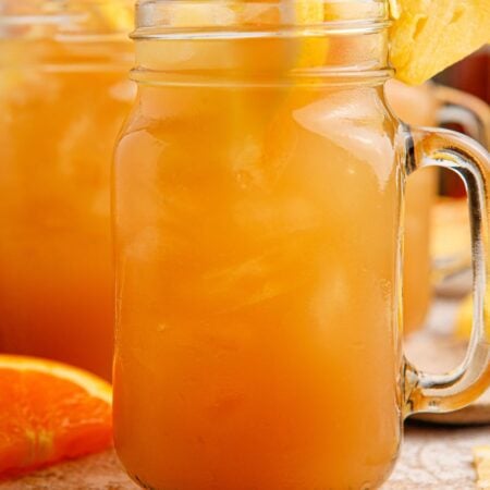 Touchdown Tea in a mason jar garnished with fruit
