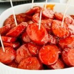 Crockpot Kielbasa Bites in a pan on table
