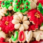 Christmas Spritz Cookies stacked on platter