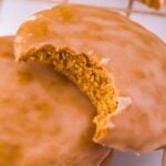 gingerbread cookie on table with a bite taken out of it