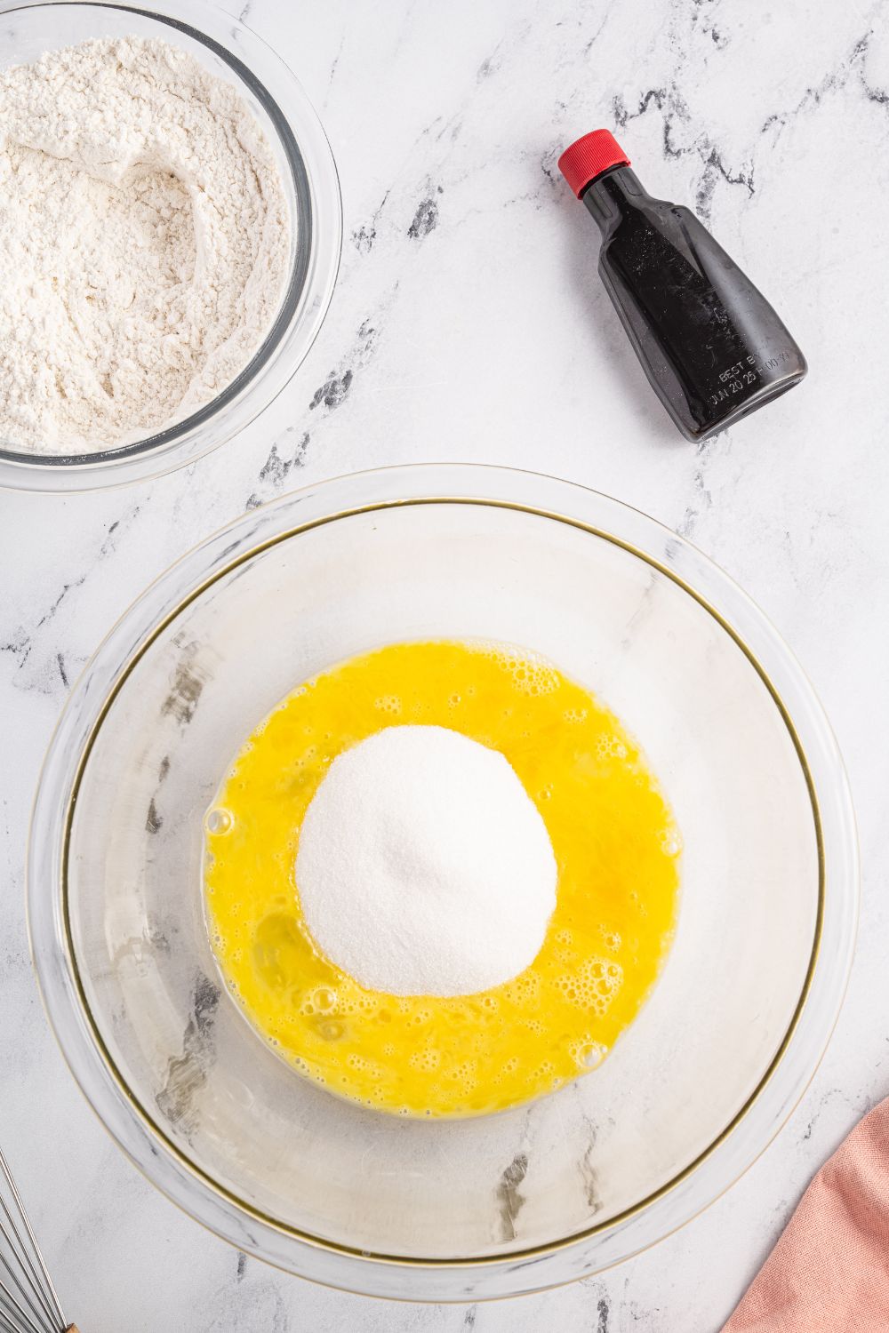 eggs and sugar in a bowl 
