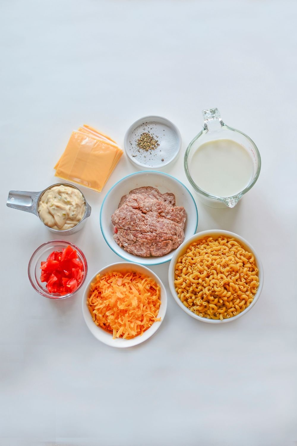Big Mac Macaroni And Cheese ingredients on table in containers 