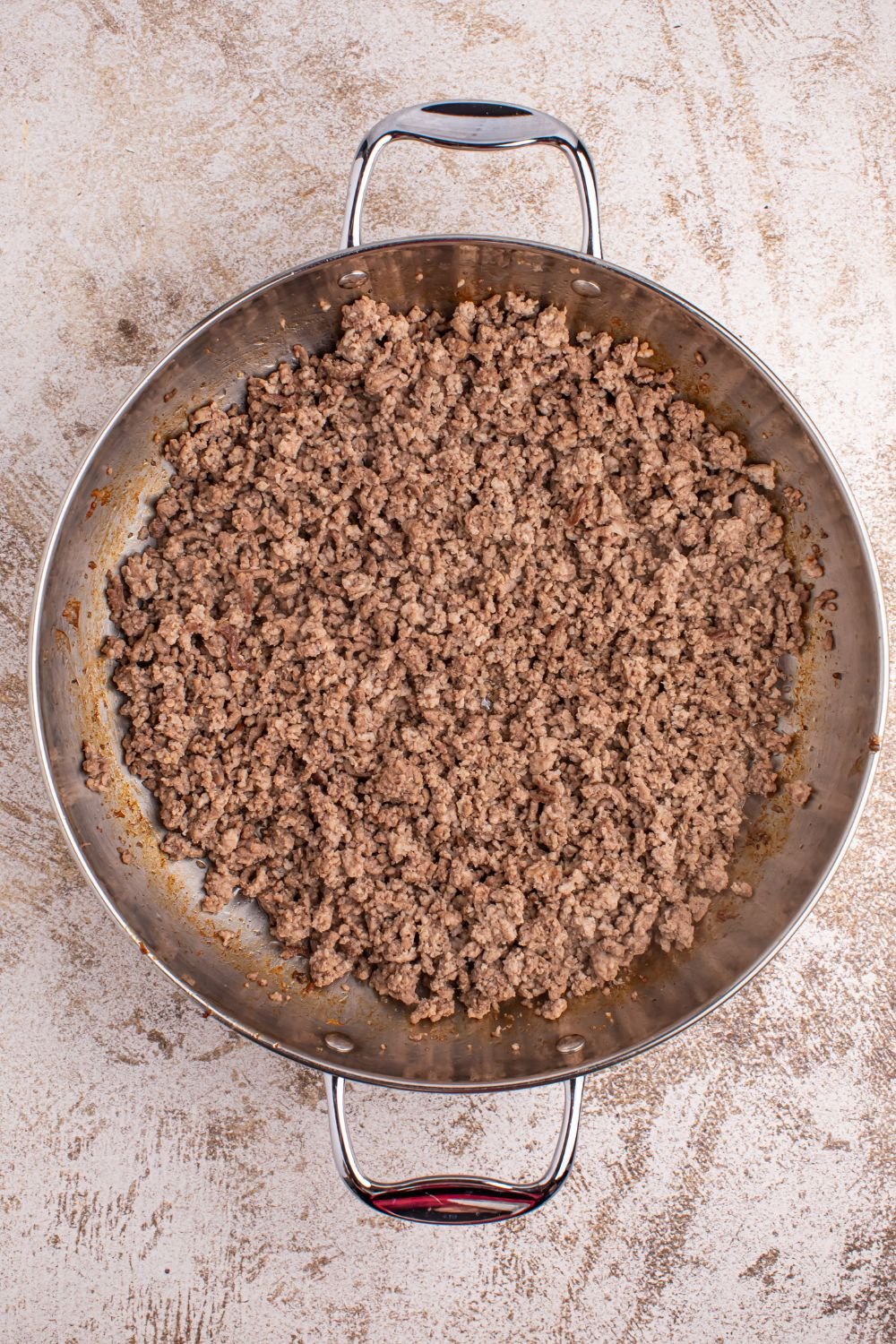 Dirty Rice - ground beef and sausage cooked up in pan 
