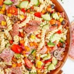 Summer Pasta Salad in a wooden bowl on table