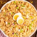 Deviled Egg Pasta Salad in a bowl with an overhead shot of bowl