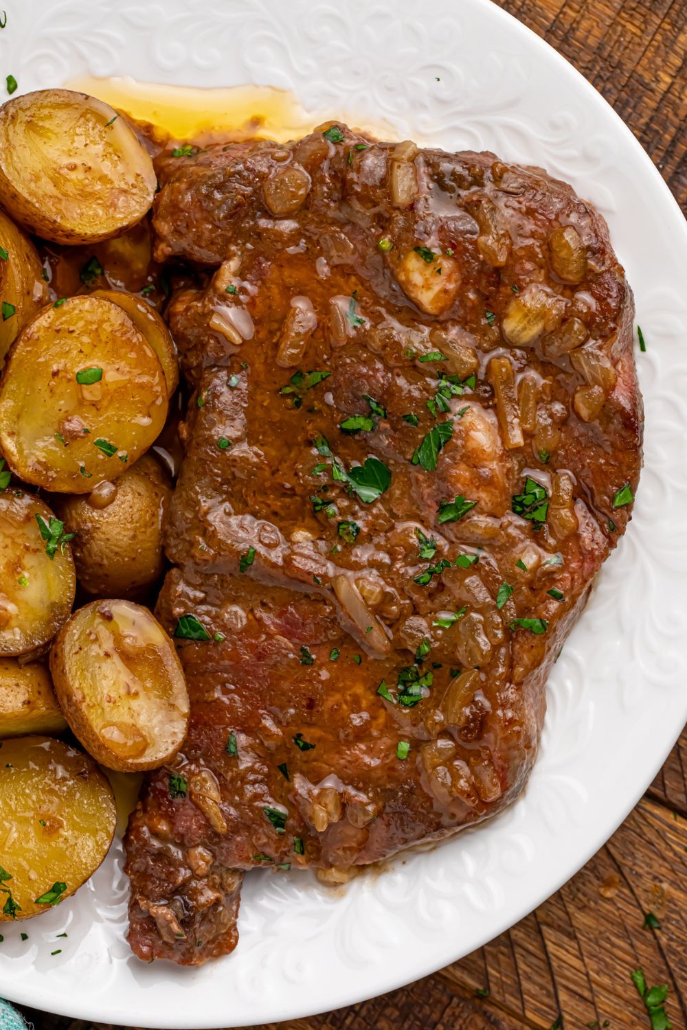Crock Pot Steak and Potatoes on a plate on table 