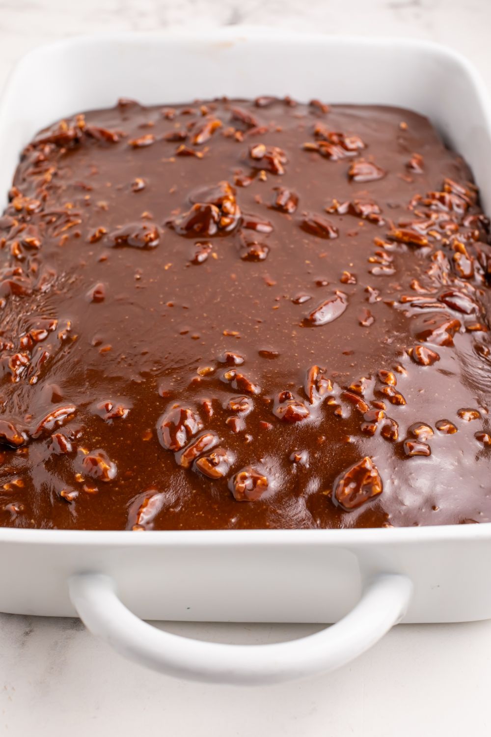 Dr. Pepper Cake setting in pan on table 