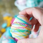 Easter Egg Oreo Truffle in hand