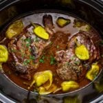 Slow Cooker Mississippi Ribeye Steaks in a slow cooker on table