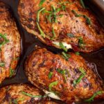 Caprese Stuffed Chicken in a skillet