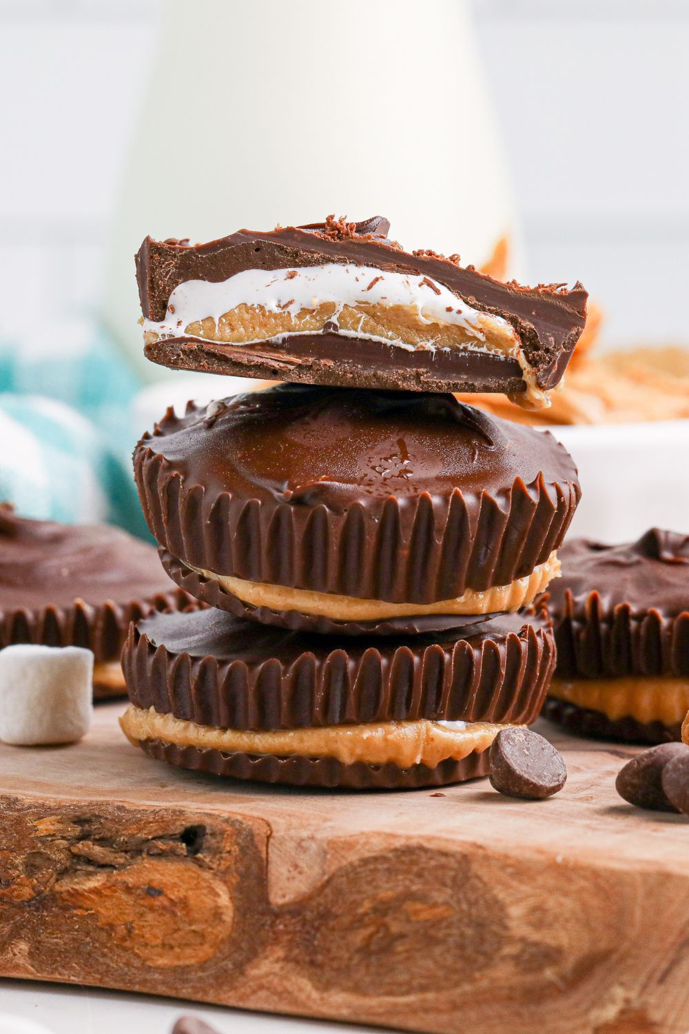 Peanut Butter Marshmallow Cups on table stacked on top of each other 