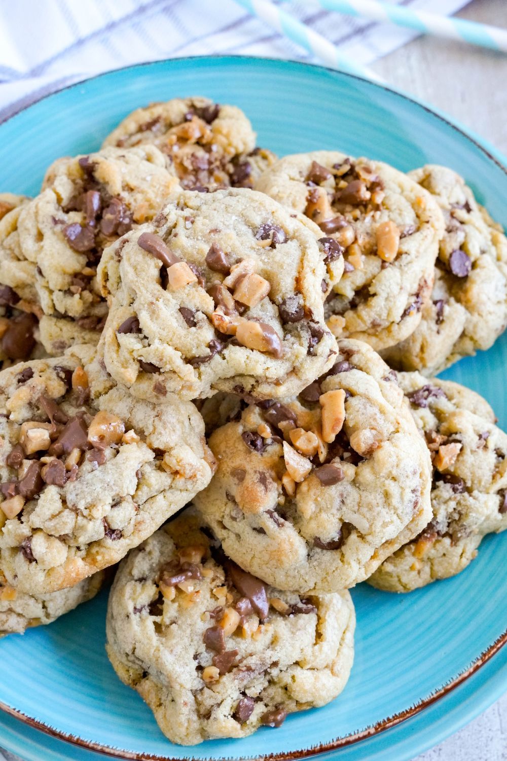 plate stacked with Chocolate Chip Toffee Cookies 