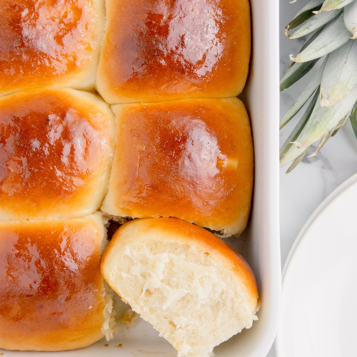 Hawaiian Dinner Rolls in a pan showing how fluffy they are
