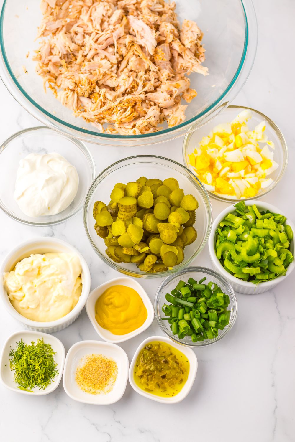 ingredients for Pickle Chicken Salad in single serve bowls on table