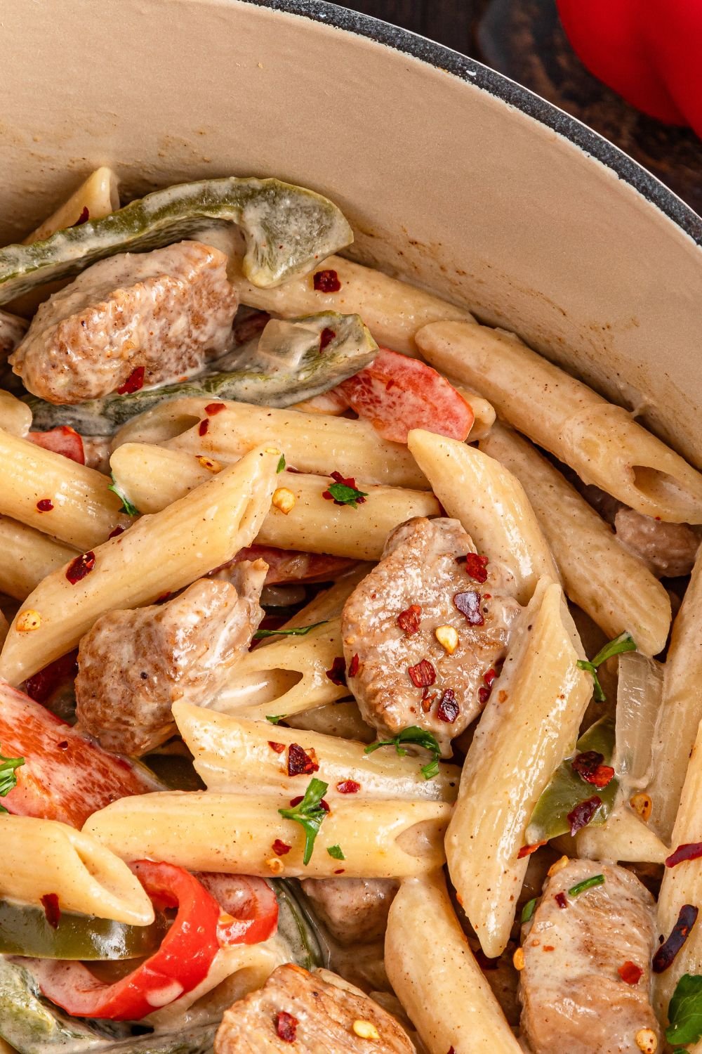 close up of creamy Rasta Pasta in a pot on table 