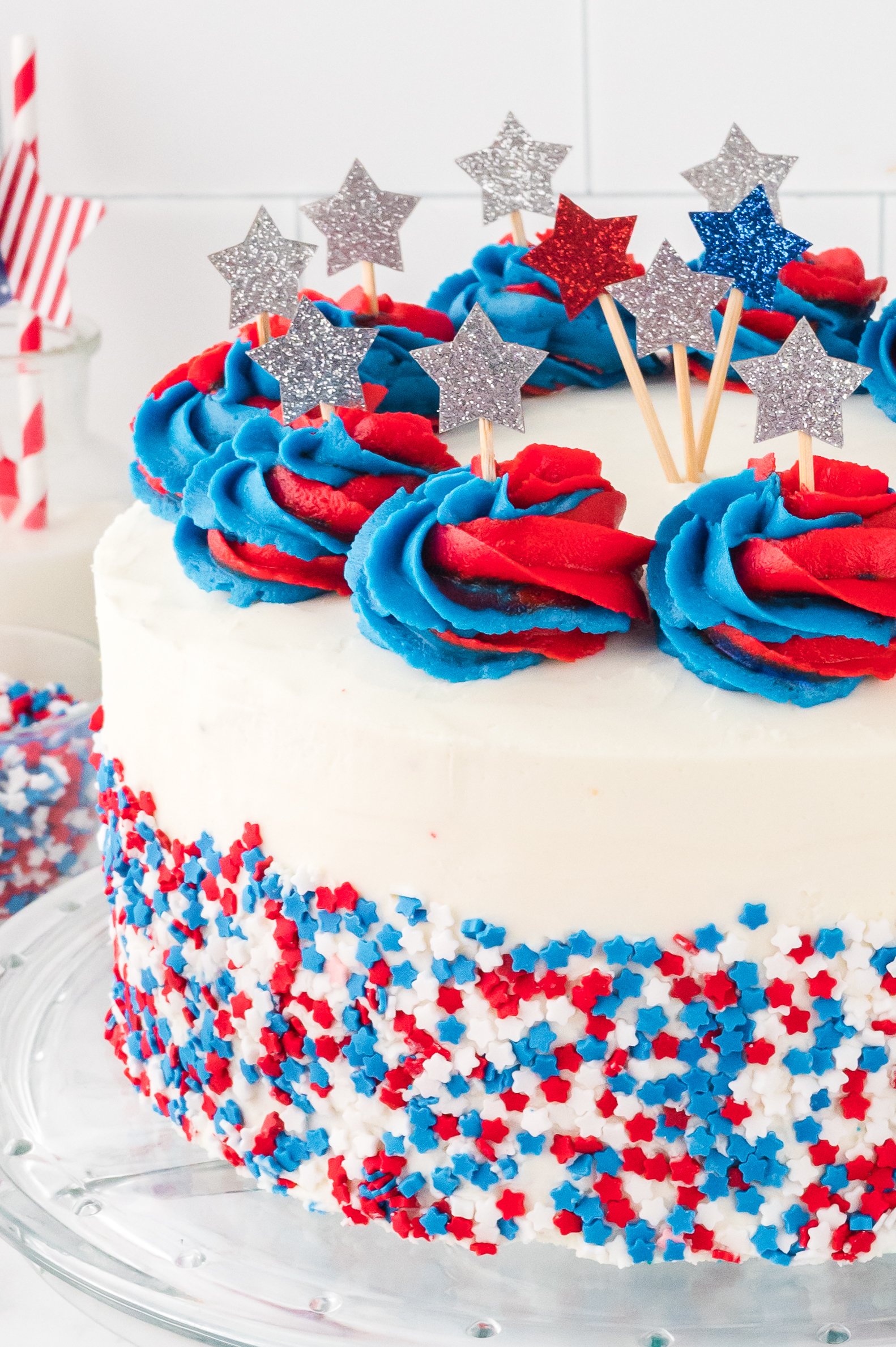 American Flag Layered Cake on a clear cake stand 