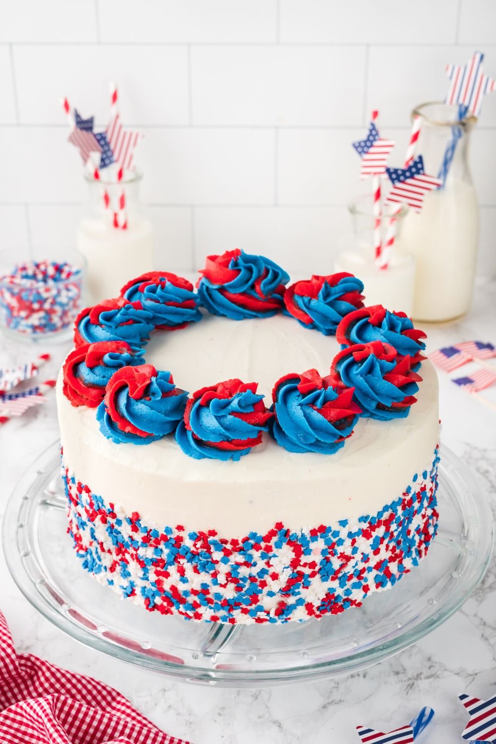 american flag cake on a pie plate on table 