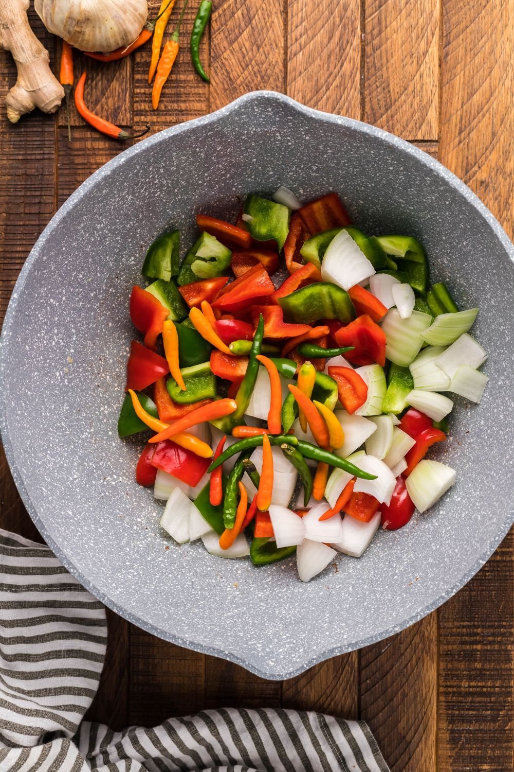 chopped veggies in a bowl on table 